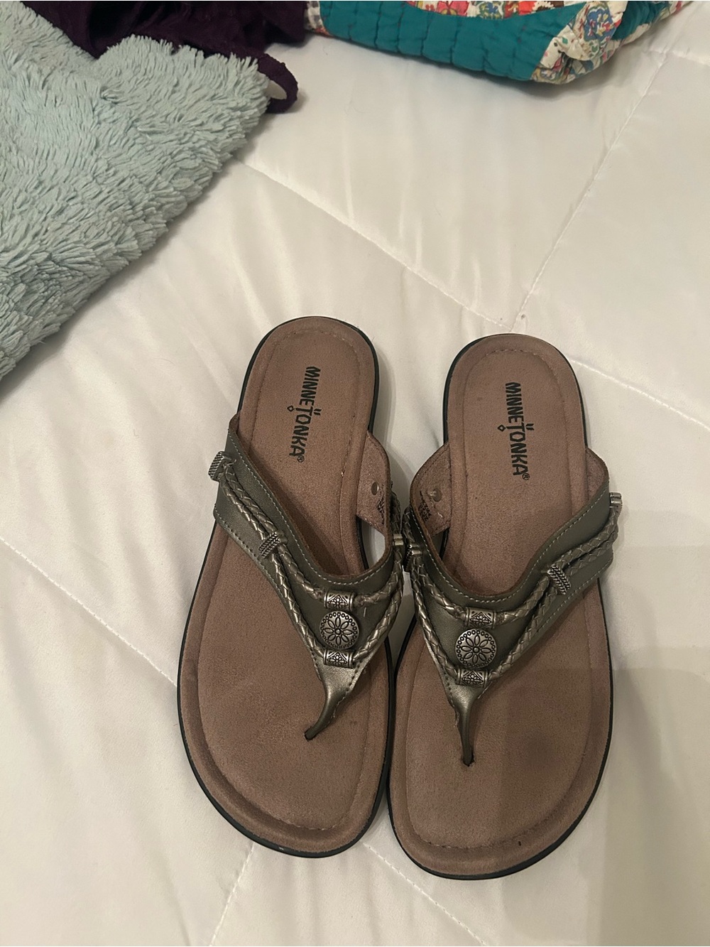 Minnetonka Metallic Brown Thong Sandals with Medallion Accent